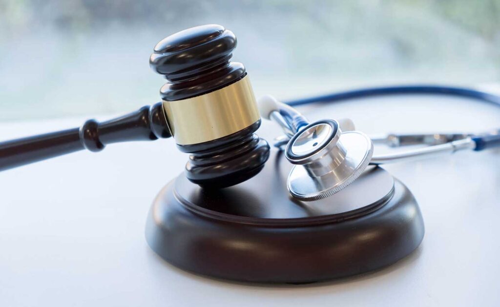Judge's gavel and stethoscope to illustrate medical malpractice
